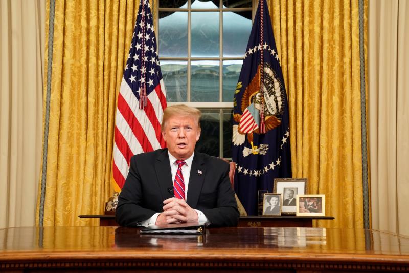 US President Donald J. Trump speaks to the nation in his first-prime address from the Oval Office of the White House in Washington, DC, USA, Jan. 8, 2019. EPA-EFE/CARLOS BARRIA / POOL