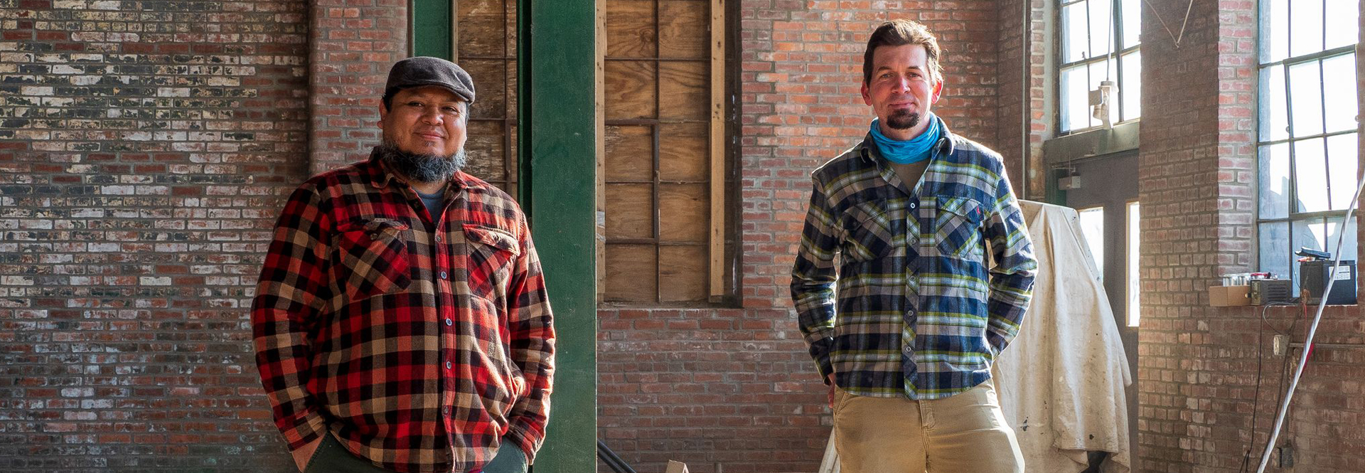 Espinoza and Panzer share their love of brewing and craft beers. Photo: Roundhead Brewing.