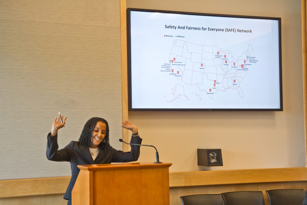 Kica Matos from the Vera Institute celebrates Philly's decision to join the network providing free immigration legal services for those facing deportation back in July 2019. Photo: Kimberly Paynter/WHYY