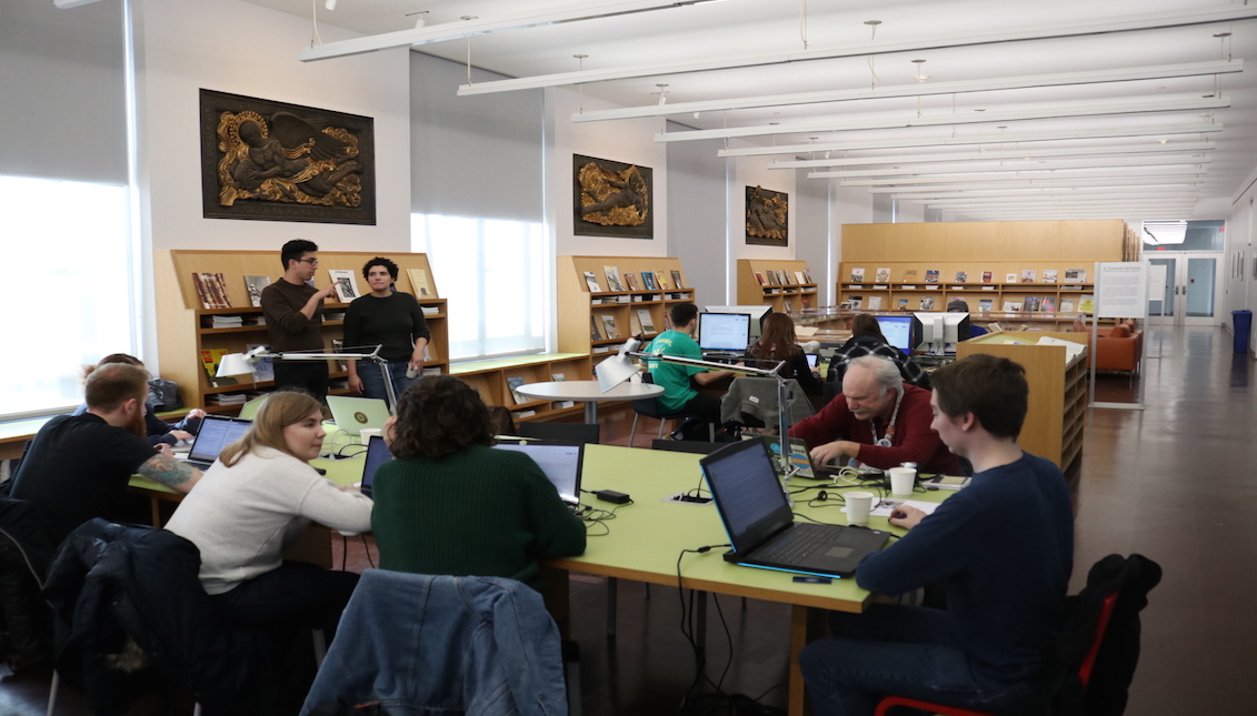 Participants worked to update the narrative of Latinx artists on Wikipedia. Photo: Nigel Thompson/AL DÍA News  