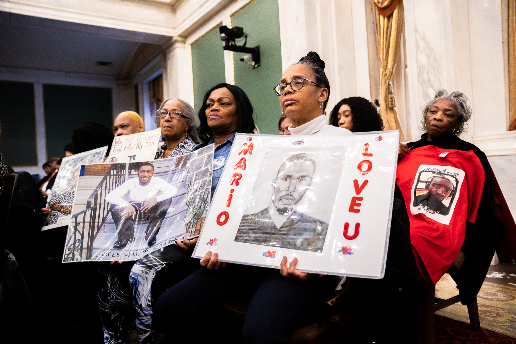 Attendees of a hearing for Philadelphia City Council's Special Committee on Gun Violence Prevention honor loved ones lost to gun violence in the city. Photo: Jared Piper/PHL Council
