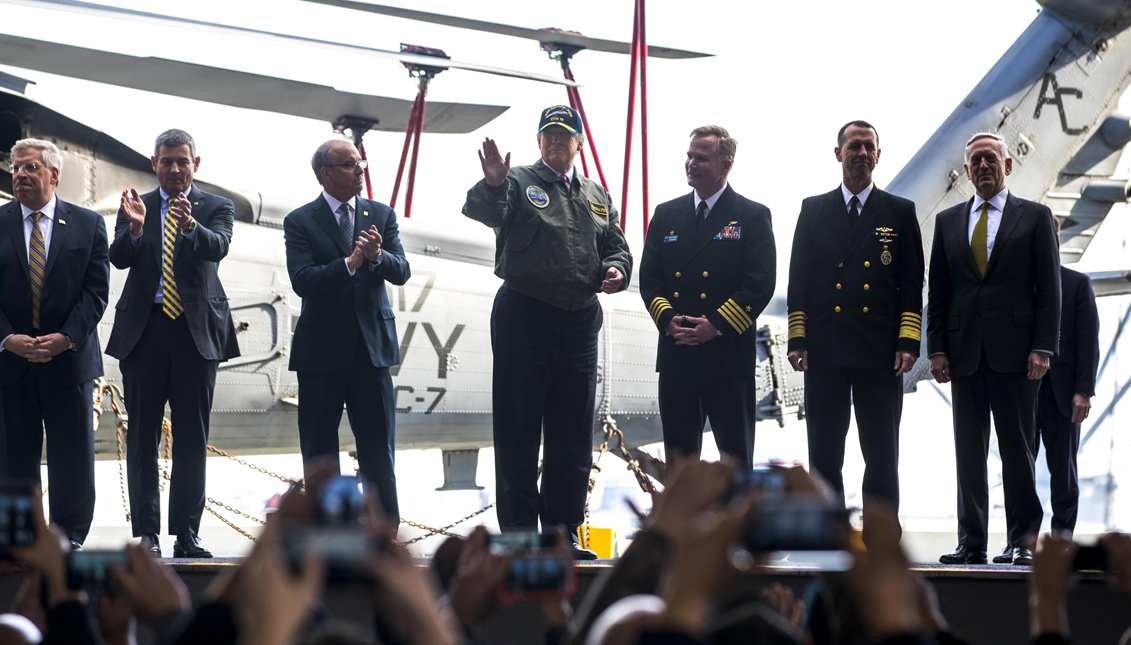 Trump says he has full confidence in Sessions US President Donald J. Trump (C), along with Secretary of Defense James Mattis (R) and Navy personnel, rides an elevator to the flight deck of the Gerald R. Ford aircraft carrier after speaking to sailors in Newport News, Virginia, USA. EFE
