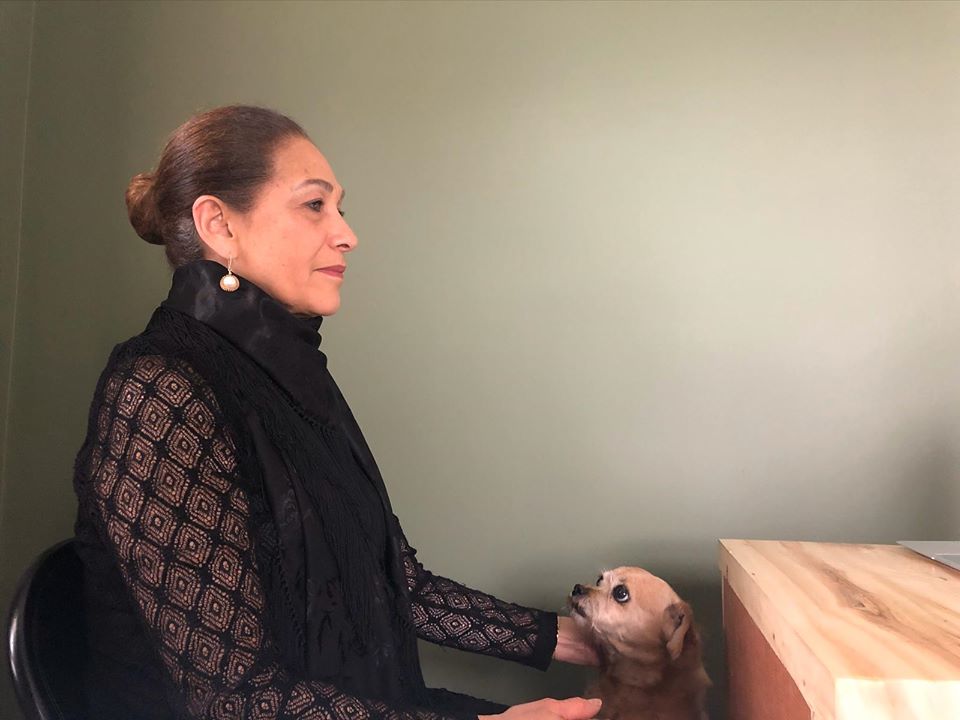 Yajaira Peréz, who plays La Madre in Teatro Quarantine's Bodas de Sangre has her filming session interrupted by her dog, Roxy. Photo: Teatro Quarantine