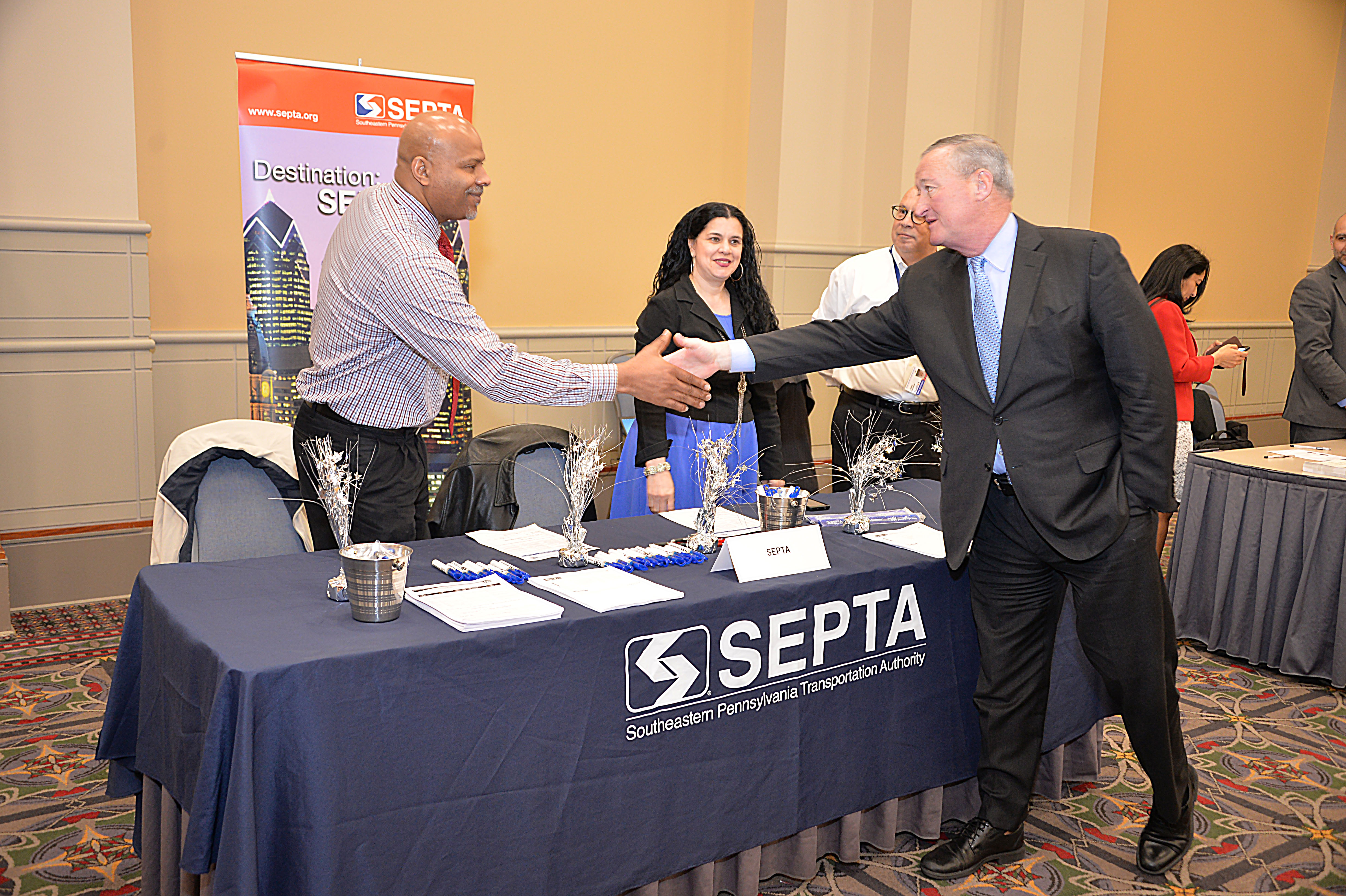 Mayor Kenney meets with employers at the Diversity Career Fair.
