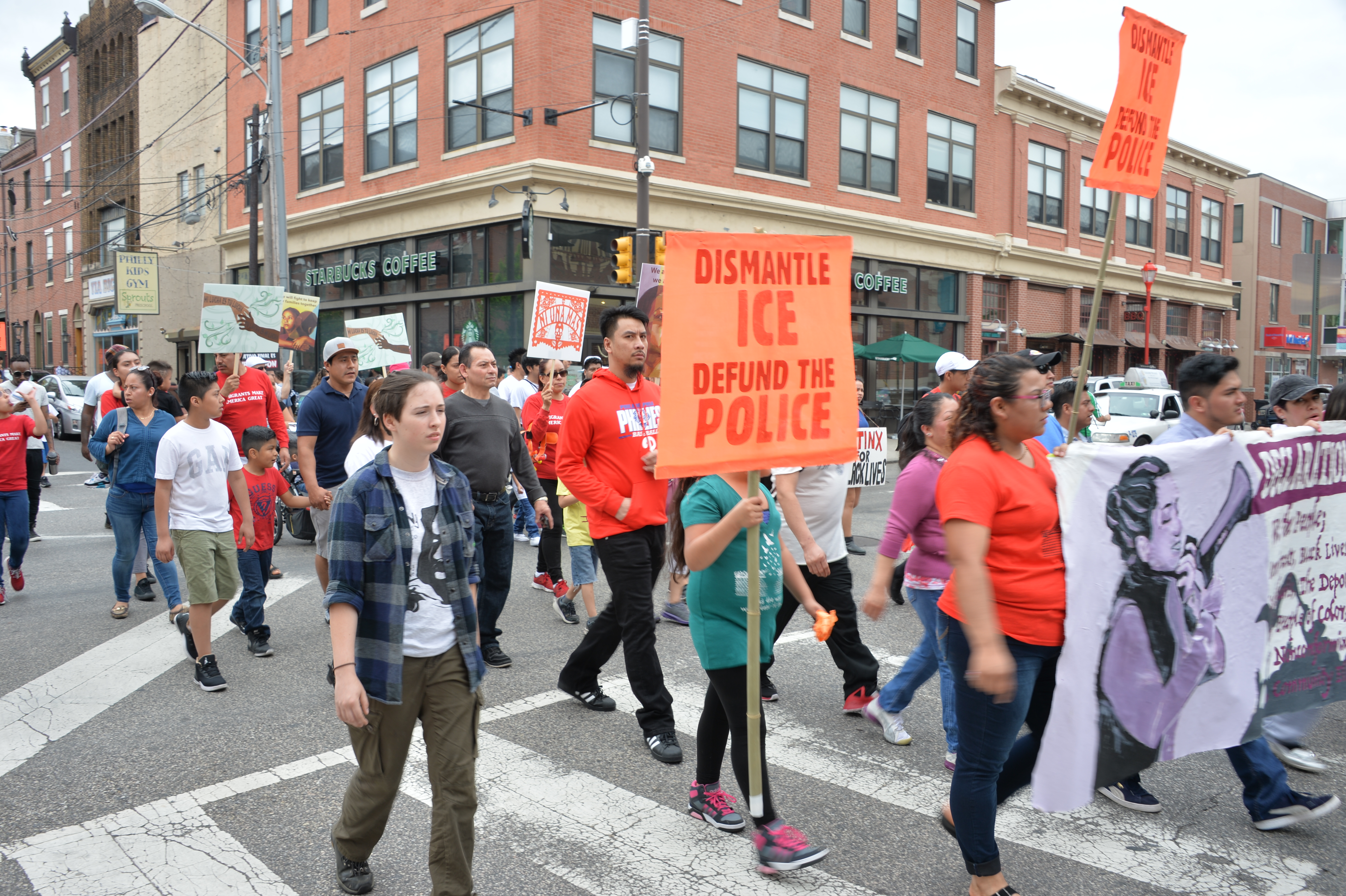 Marchers crossing South Street on their way to Center City as part of the Day without Immigrants March in Philadelphia.  Photo: Peter Fitzpatrick/AL DIA News