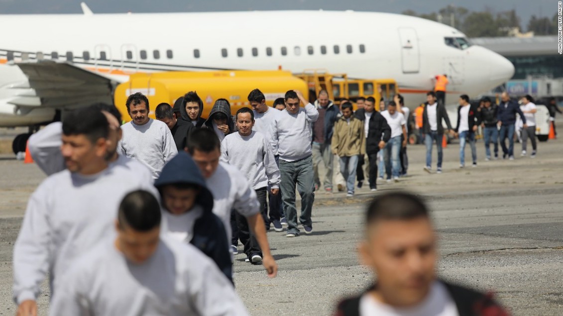 Immigrants deported from the United States arrive on an ICE deportation flight on February 9. Source: CNN.