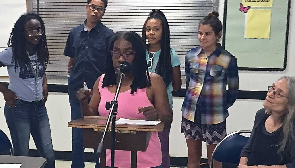 Ramona Africa (center) at ATAC meeting with Jubilee School students (lt to right) Ishtar El, Nigel Carter, Ella Adams and Hannah Roemer-Block and teacher Karen Falcon. LBWPhoto
