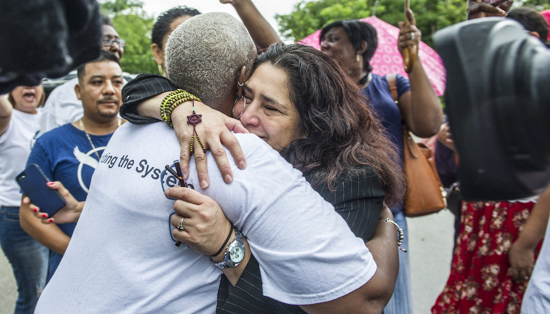 South Florida domestic activists gathered in front of an immigration building on Monday to clothe undocumented Honduran Reyna Gomez, facing the possibility that she might be the victim of one of the so-called "silent raids," which did not happen. EFE/Giorgio Viera