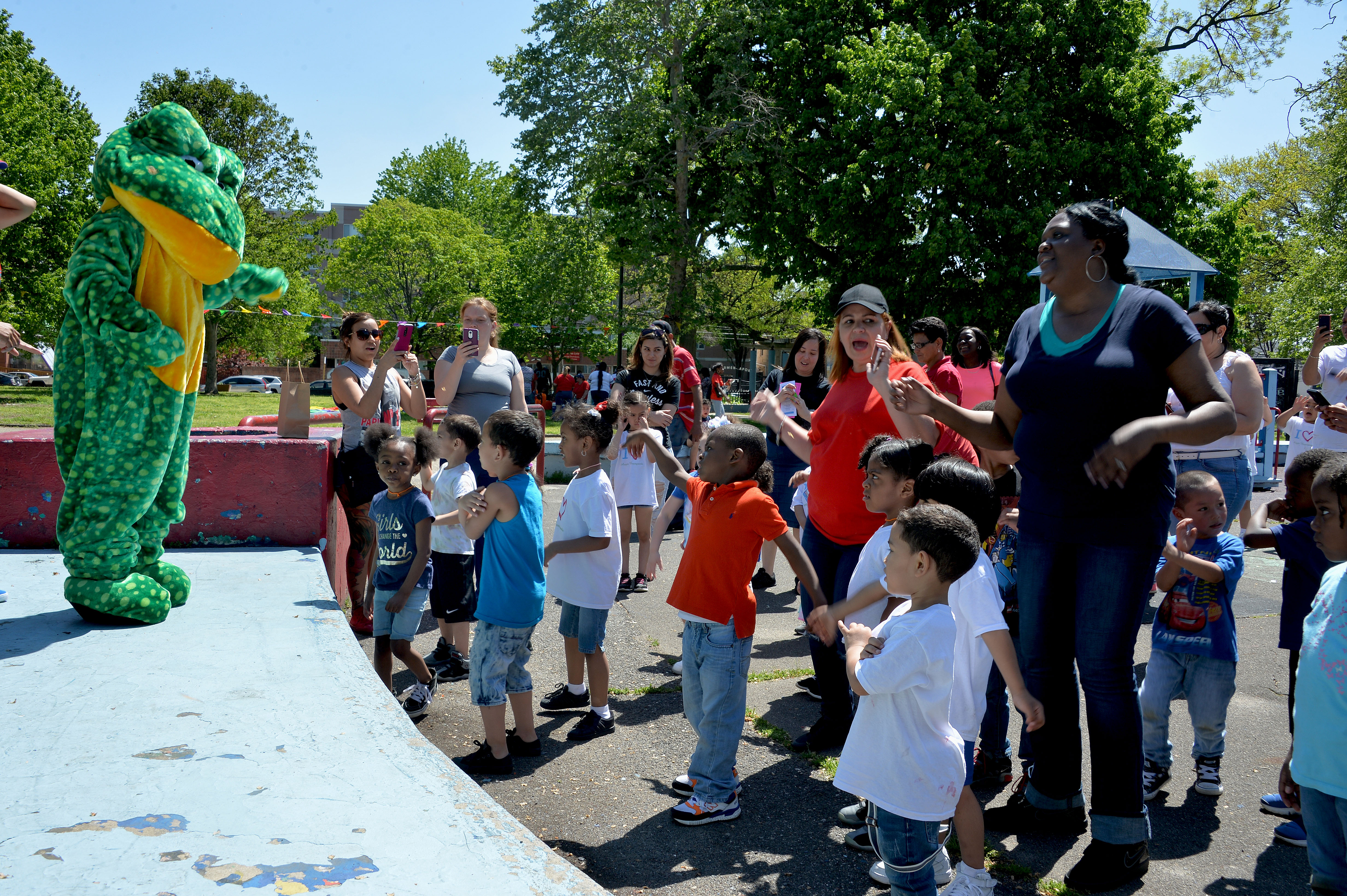 Children participate in the frog dance as part of the Norris Square Community Alliance Carnival.  Photo: Peter Fitzpatrick/AL DIA News