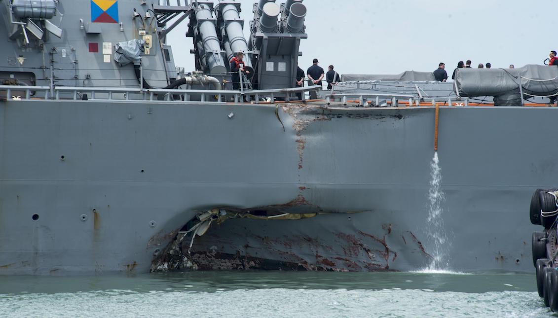 Image courtesy of the seventh US Navy fleet showing the damaged hull of the USS John S. McCain destroyer in Singapore on August 21, 2017. Five US sailors were injured and ten others were found missing after the collusion in Singapore's Strait waters. EFE / US Navy