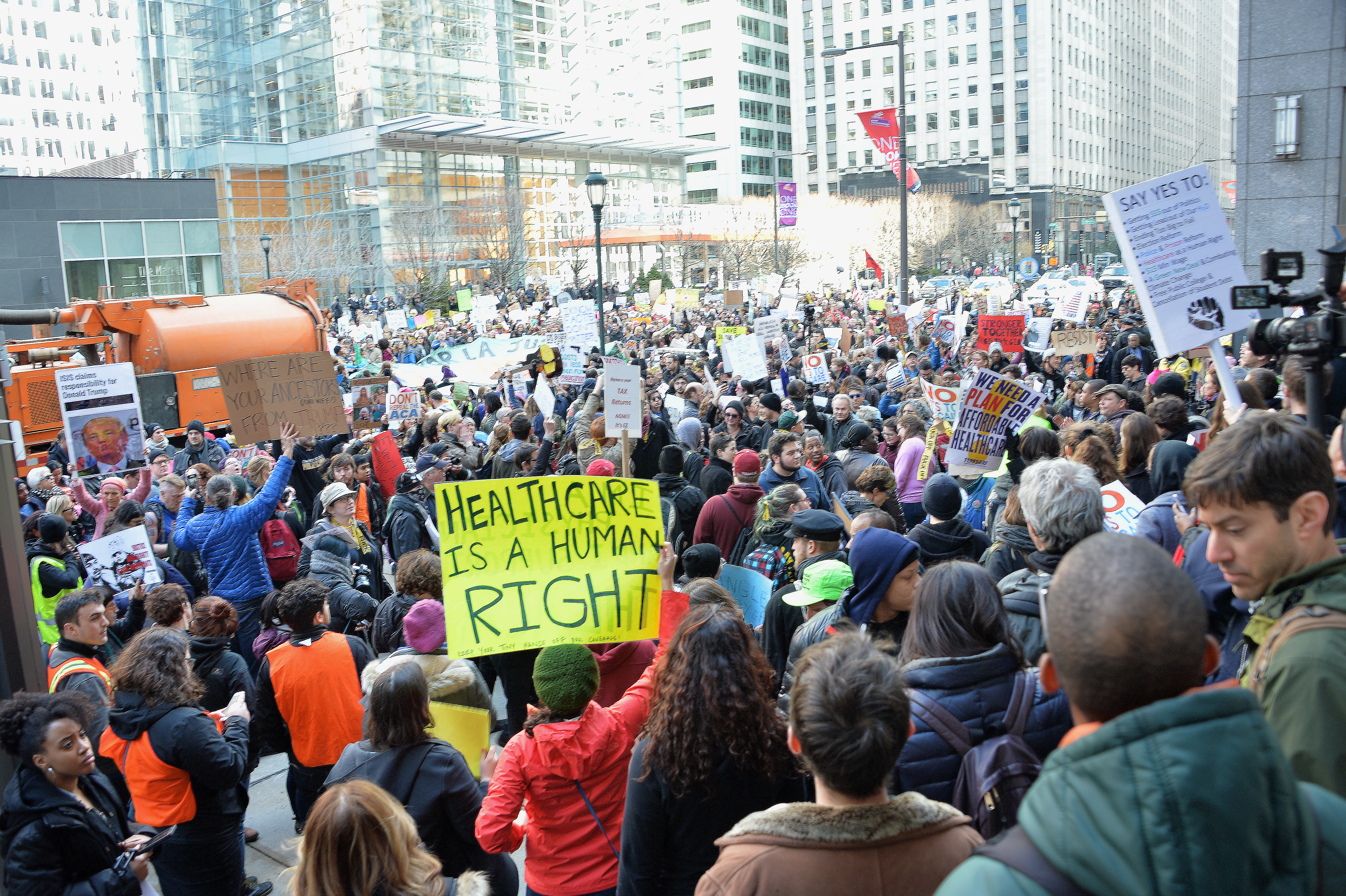 Protesters gather outside of BNY Melon Center after leaving the Loews Hotel.
