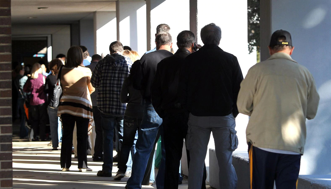 Voters must endure long lines at the polls, but in just days they have made history. Photo: DallasNews
