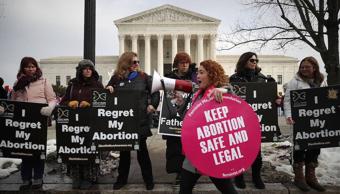 WASHINGTON, DC - JANUARY 18: Protesters on both sides of the abortion issue gather in front of the U.S. Supreme Court building during the Right To Life March, on January 18, 2019, in Washington, DC. (Photo by Mark Wilson/Getty Images)