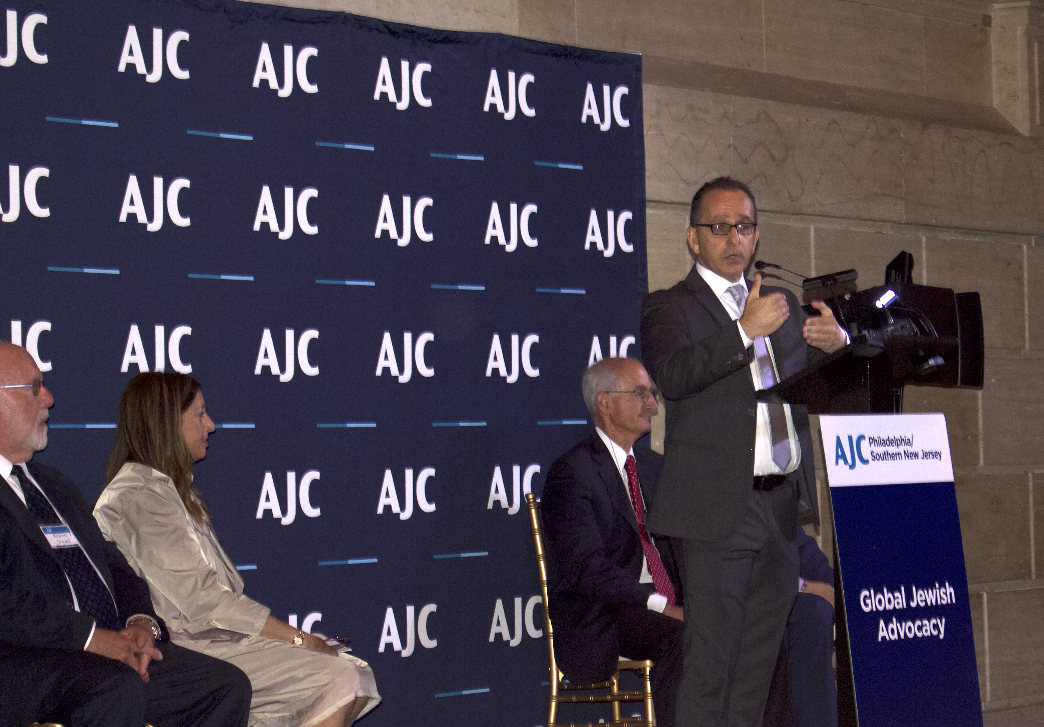 Marcia Bronstein, regional director of AJC Philadelphia/Southern New Jersey, listens as Juan Dircie, keynote speaker for the Annual Award Dinner, spoke about the Jewish and Latino communities. Photo: Rivka Pruss 