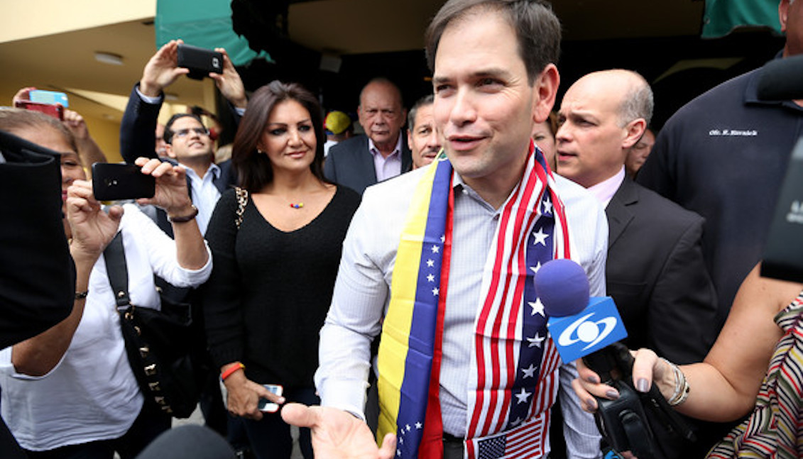 U.S. Senator Marco Rubio (R-FL) walks out of the El Arepazo 2 restaurant on February 28, 2014 in Doral, Florida. Rubio and Florida Governor Rick Scott held a meet and greet with the Venezuelan community to discuss the ongoing crisis in Venezuela. (Feb. 27, 2014 - Source: Joe Raedle/Getty Images North America)