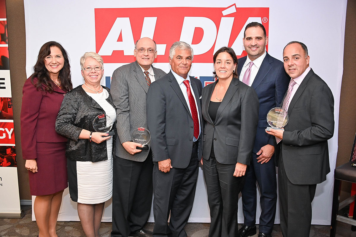 From left to right: Advisory Board Member Sharon Lopez, Award winner Carmen Garcia, Award winner William Gonzalez, Hon. Judge Juan Sánchez, Advisory Board Member Jacqueline C. Romero, Advisory Board Member Hector Ruiz, Award winner Daniel Mateo. Photo: Peter Fitzpatrick/AL DÍA News.