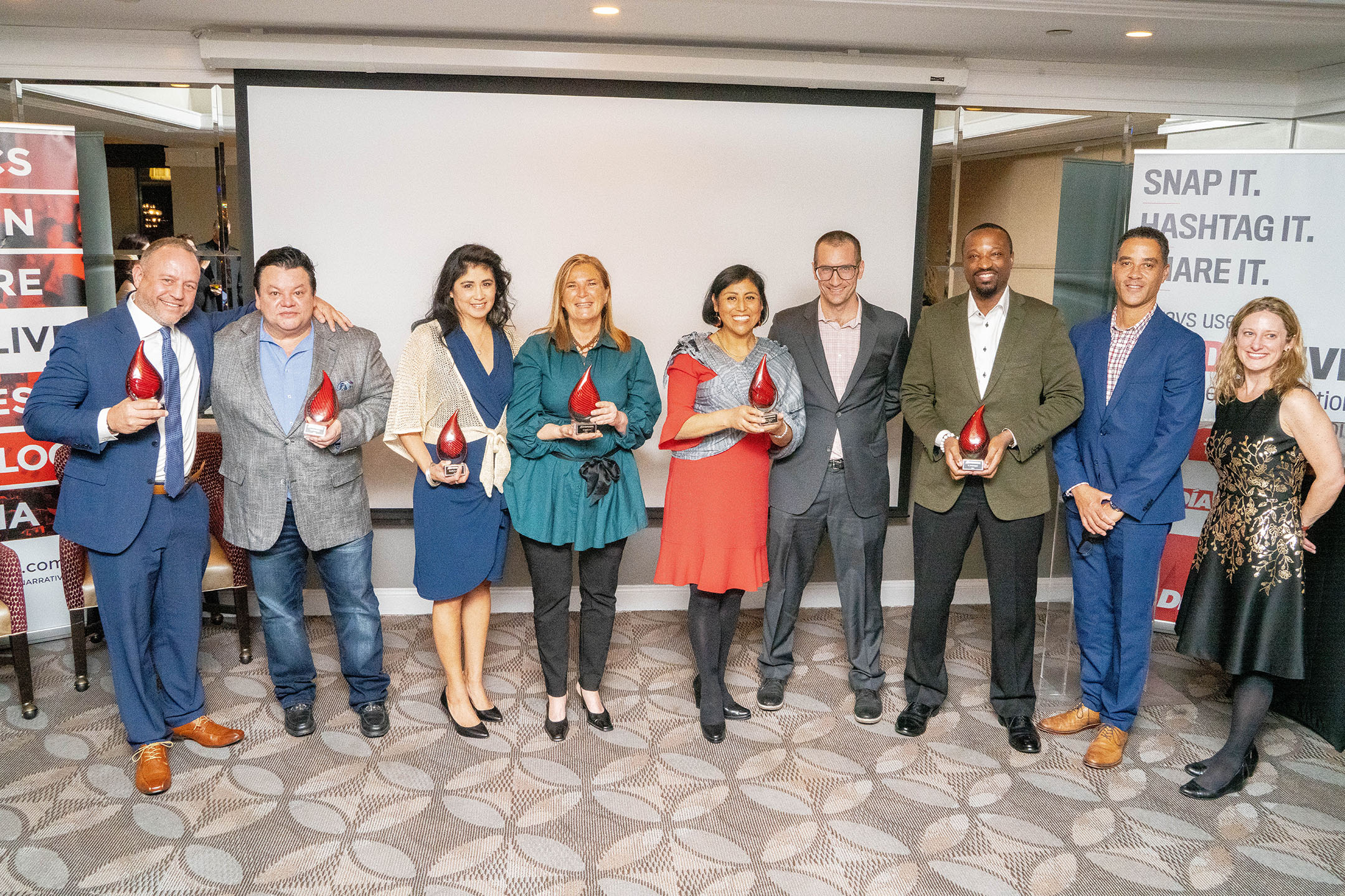 The 2021 AL DÍA Top Entrepreneurs, joined by Kenneth Anderson, Vice President of Civic Affairs at The Chamber of Commerce for Greater Philadelphia; and Anne Bovaird Nevins, President of PIDC. Photo: Peter Fitzpatrick/AL DÍA News.