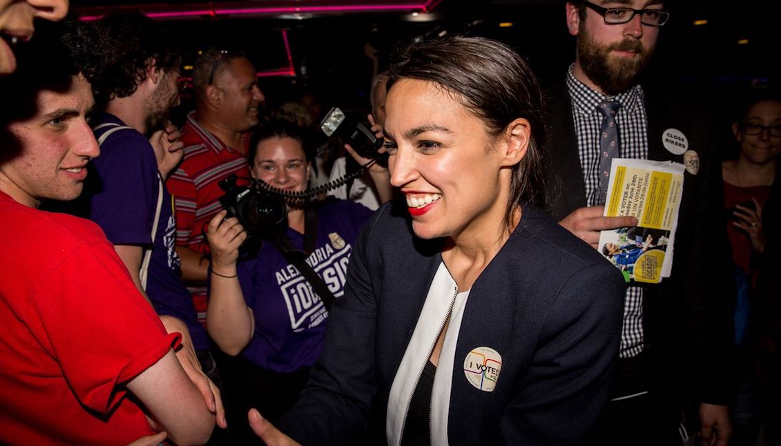 Alexandria Ocasio-Cortez celebrates with supporters at a victory party in the Bronx after upsetting current Democratic Rep. Joseph Crowley on June 26, 2018. Scott Heins / Getty Images