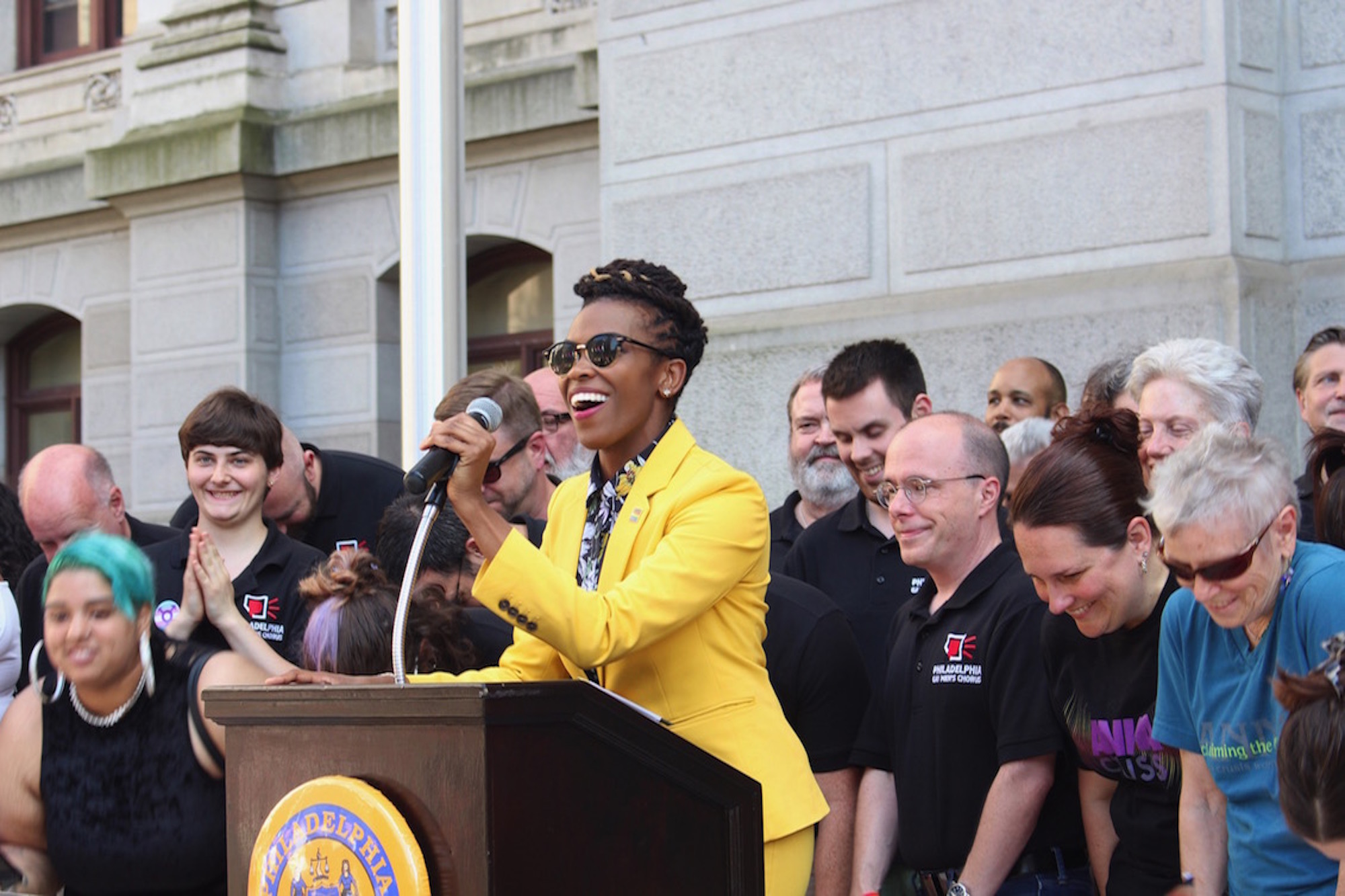 Amber Hikes speaks at the raising of the pride flag at City Hall on June 6, 2019. Photo: Emily Neil/AL DÍA News.