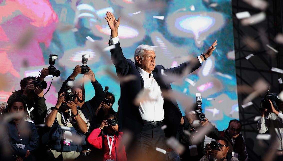 Hundreds of sympathizers of the leftist candidate Andrés Manuel López Obrador, acclaim him during his arrival at the Plaza de la Constitución in Mexico City after learning of his triumph in the elections on Sunday, July 1, 2018. EFE / Alex Cruz