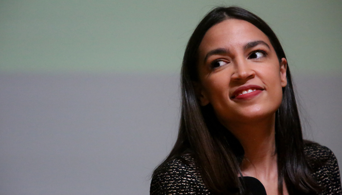 NEW YORK, NY - DECEMBER 14: Rep. Alexandria Ocasio-Cortez (D-NY) takes questions during a Green New Deal For Public Housing Town Hall on December 14, 2019 in the Queens borough of New York City. (Photo by Yana Paskova/Getty Images)