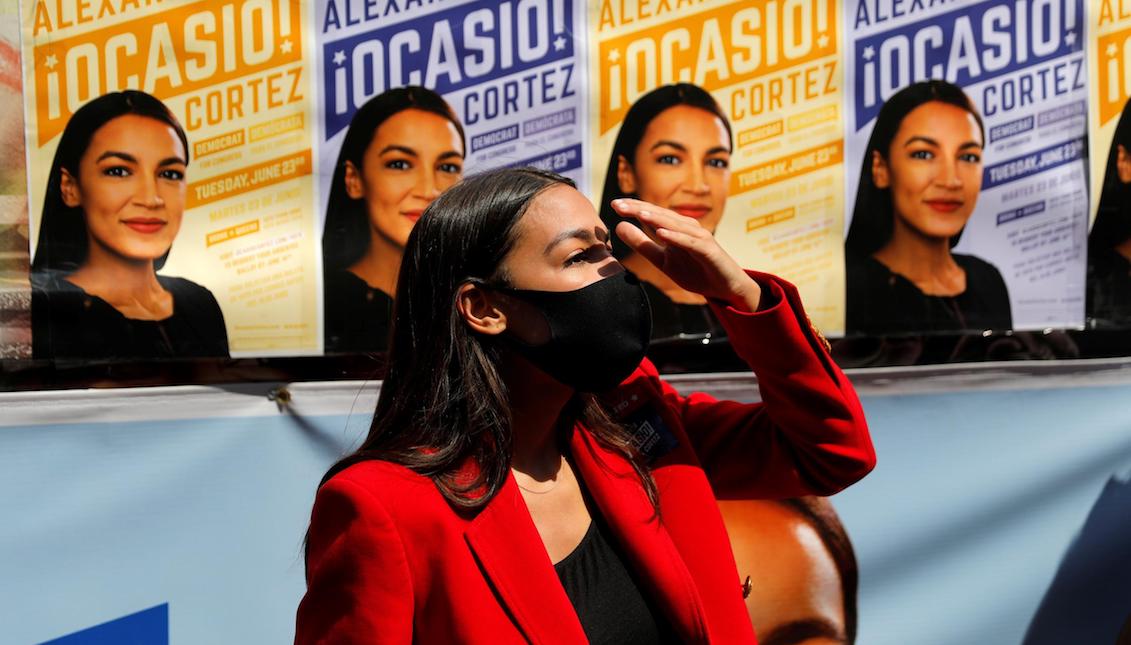 Ocasio-Cortez makes a stop in her campaign in Queens on Tuesday ( Reuters )