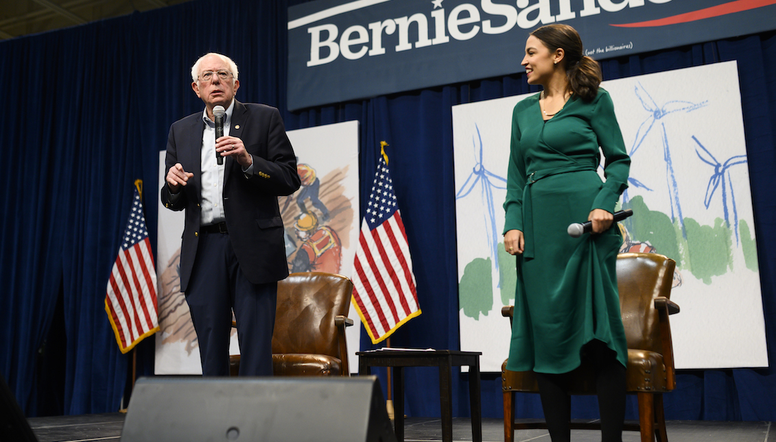 DES MOINES, IA - NOVEMBER 09: Democratic Presidential candidate Bernie Sanders (I-VT) and U.S. Rep. Alexandria Ocasio-Cortez (D-NY) field questions from audience members at the Climate Crisis Summit at Drake University on November 9, 2019 in Des Moines, Iowa. (Photo by Stephen Maturen/Getty Images)