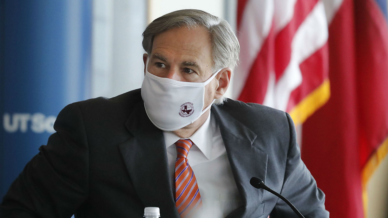 Texans are letting their governor know what they think of the mask mandate recall. But not everyone agrees. Photo: AP Images
