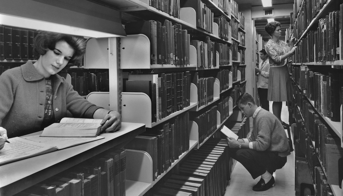 University of Pennsylvania students locate books on the stacks at the new Charles Patterson Van Pelt Library in 1962. (Photo by Authenticated News/Archive Photos/Getty Images)