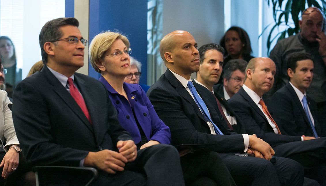 From left to right, Congressman Xavier Becerra; Senator Elizabeth Warren; Senator Cory Booker; Congressman John Sarbanes Congressman John Delaney (Panelist) on April 6, 2016, at a meeting with  former Secretary of Labor Thomas E. Perez. Photo: US Labor Department/Wikipedia
