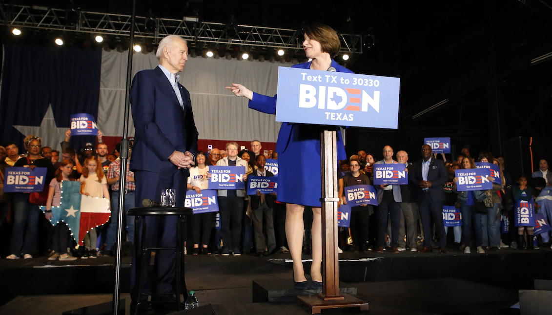 DALLAS, TX - MARCH 02: Democratic presidential candidate former Vice President Joe Biden is joined on stage by Sen. Amy Klobuchar (D-MN) during a campaign event on March 2, 2020 in Dallas, Texas. Klobuchar has suspended her campaign and endorsed Biden before the upcoming Super Tuesday Democratic presidential primaries. (Photo by Ron Jenkins/Getty Images)