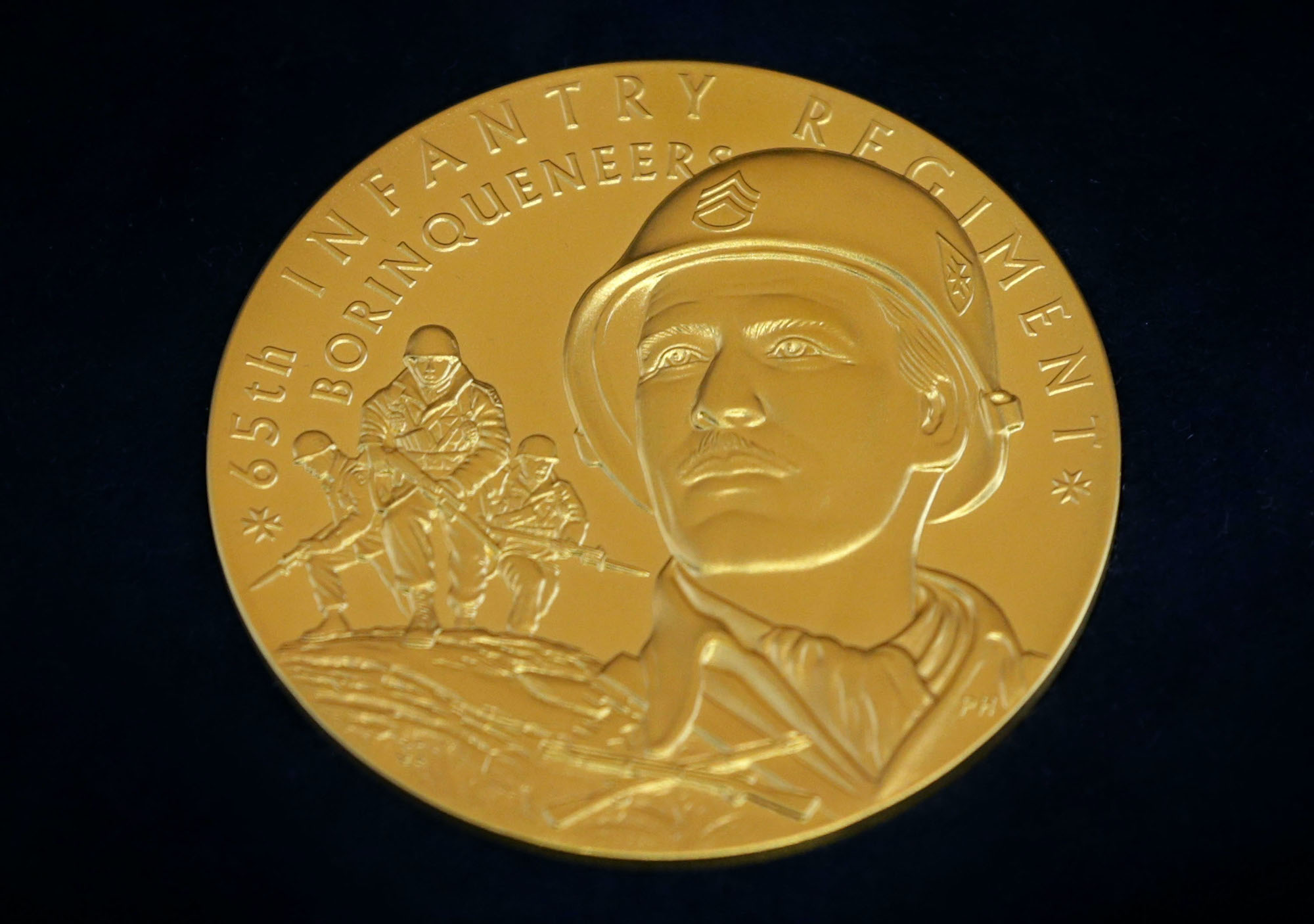 The Congressional Gold Medal awarded to members of the Borinqueneers in 2016. Photo: Alex Wong/Getty Images.
