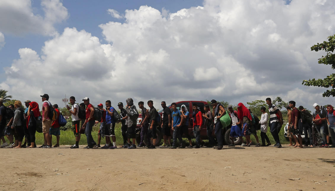 The second caravan of migrants, mostly Hondurans, crossed on Monday through the shallow part of the Suchiate River, which separates Guatemala from Mexico, in a new attempt to continue its journey to the United States. EFE/Esteban Biba.