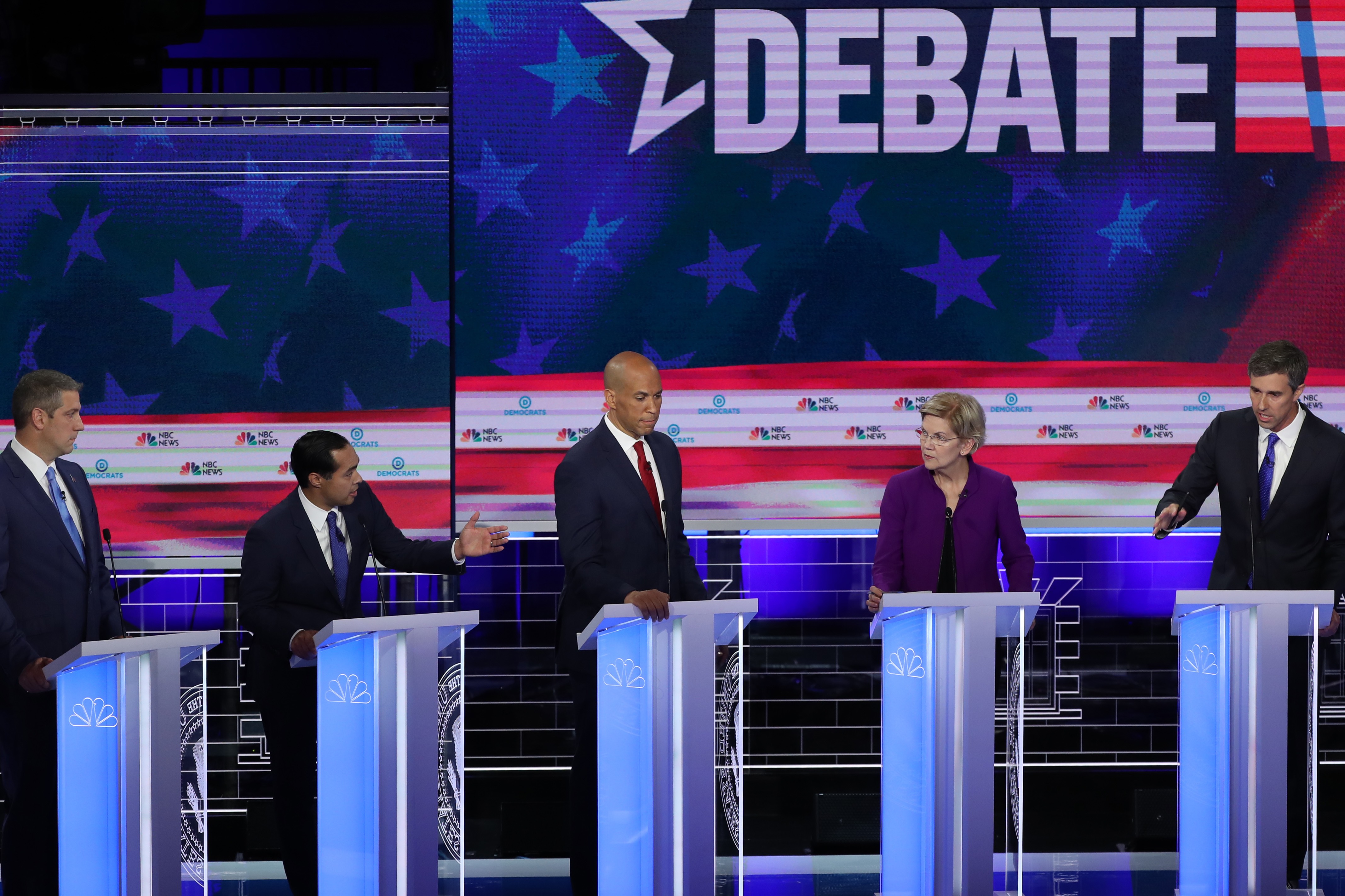 (L-R) Rep. Tim Ryan (D-OH), former housing secretary Julian Castro, Sen. Cory Booker (D-NJ), Sen. Elizabeth Warren (D-MA) and former Texas congressman Beto O'Rourke take part in the first night of the Democratic presidential debate on June 26, 2019, in Miami, Florida. Photo by Joe Raedle/Getty Images