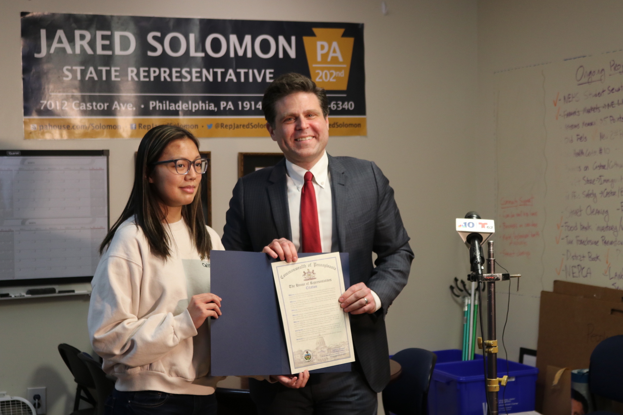 Rep. Jared Solomon stands with Christina Lu after presenting her with a citation from the PA House of Representatives. Photo: Brittany Valentine/AL DÍA News.