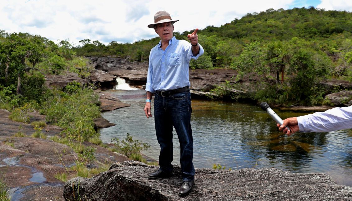 Colombian President Juan Manuel Santos visits Cano Cristales, referred to as 'the most beautiful river in the world', in La Macarena, Meta, Colombia, Sept. 27, 2017. EPA-EFE/FILE/Leonardo Muñoz
