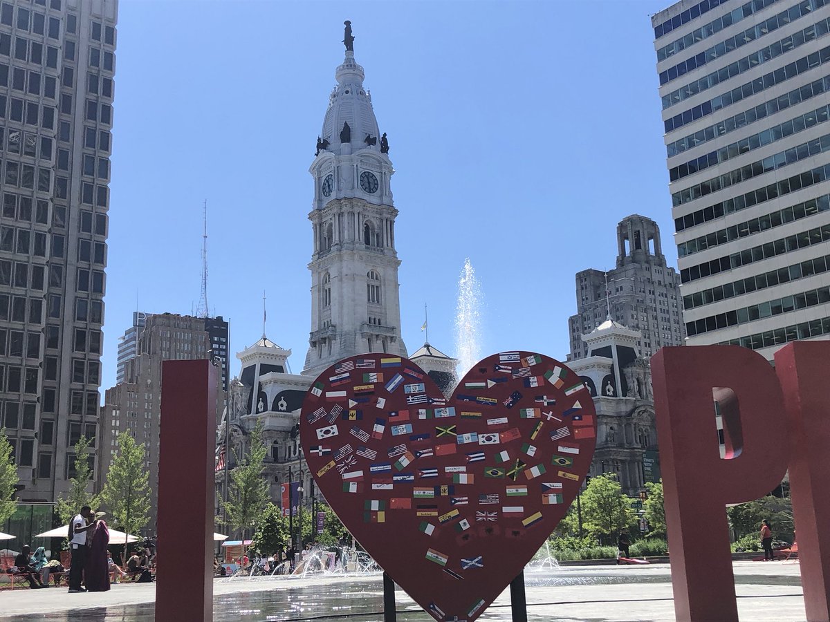 Participants in the Celebrate Immigrants event placed the flags of various countries on the art installation "I Love Philly" on June 4. Photo: Jensen Toussaint / AL DÍA News