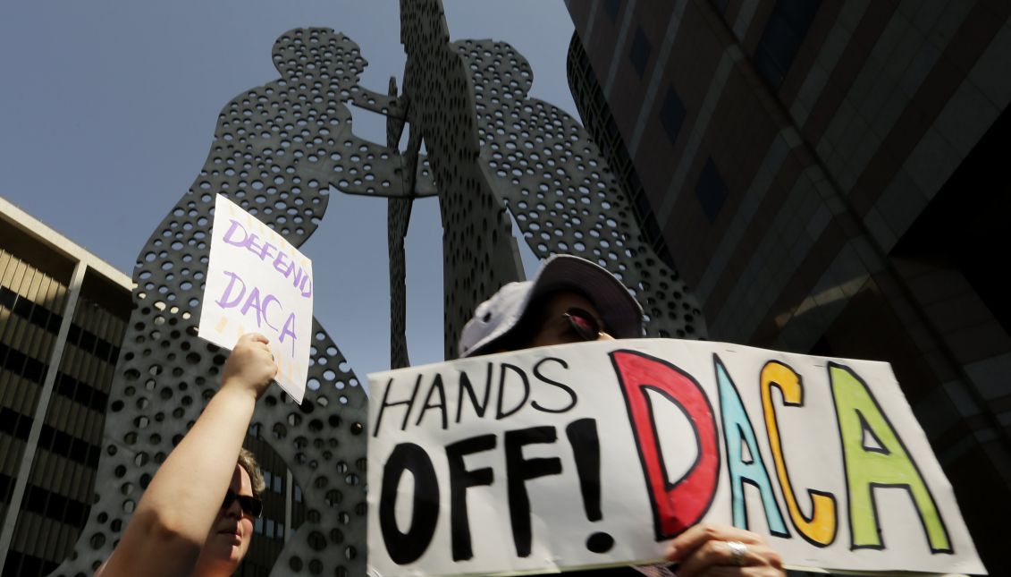 Protesters attend a rally in support of Deferred Action for Childhood Arrivals (DACA) at the Edward Roybal Federal Building in downtown Los Angeles, California, USA Sept. 1, 2017. EPA-EFE/PAUL BUCK
