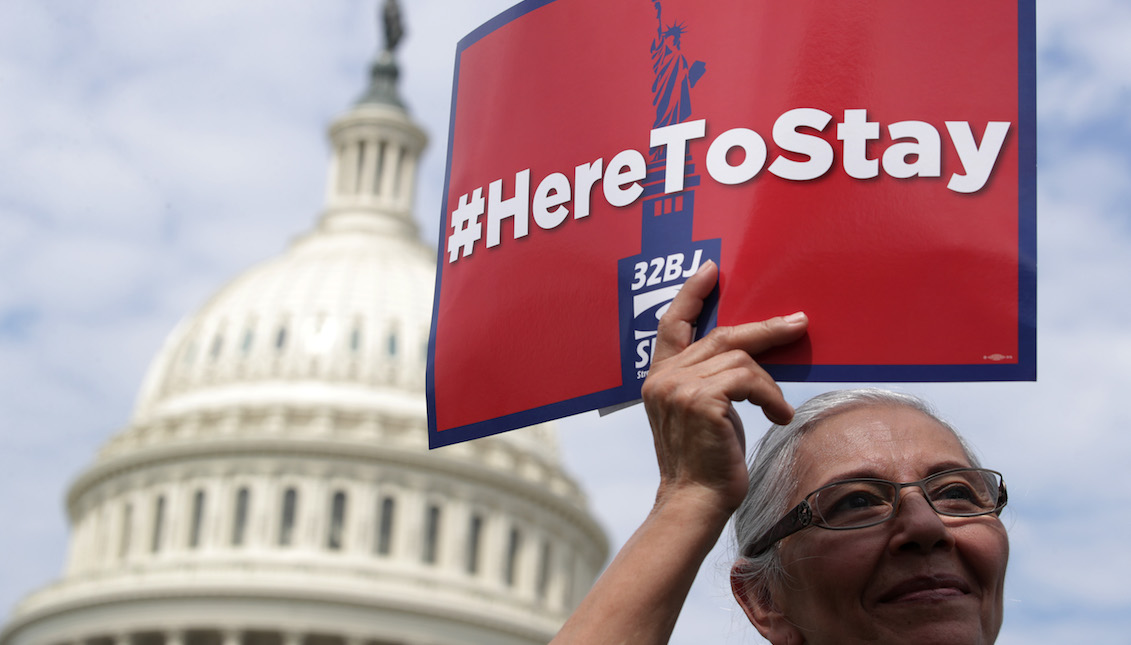 WASHINGTON, DC - SEPTEMBER 09: An activist holds a sign as she participates in a news conference on immigration on September 9, 2019, on the ground of the U.S. Capitol in Washington, DC. (Photo by Alex Wong/Getty Images)