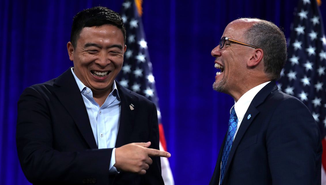 SAN FRANCISCO, CALIFORNIA - AUGUST 23: Democratic presidential candidate Andrew Yang (L) greets Democratic National Committee chairman Tom Perez (R) before speaking during the Democratic Presidential Committee (DNC) summer meeting on August 23, 2019, in San Francisco, California. (Photo by Justin Sullivan/Getty Images)