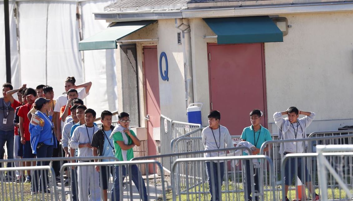 Children line up to enter a tent at the Homestead Temporary Shelter for Unaccompanied Children in Homestead, Florida, Feb. 19, 2019. Photo: AP