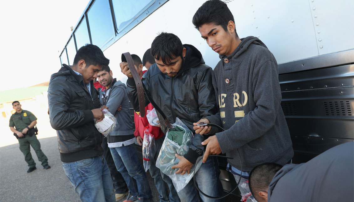 HIDALGO, TX - MARCH 14: Immigrants collect their belongings before being deported across an international bridge into Mexico on March 14, 2017 from Hidalgo, Texas. (Photo by John Moore/Getty Images)