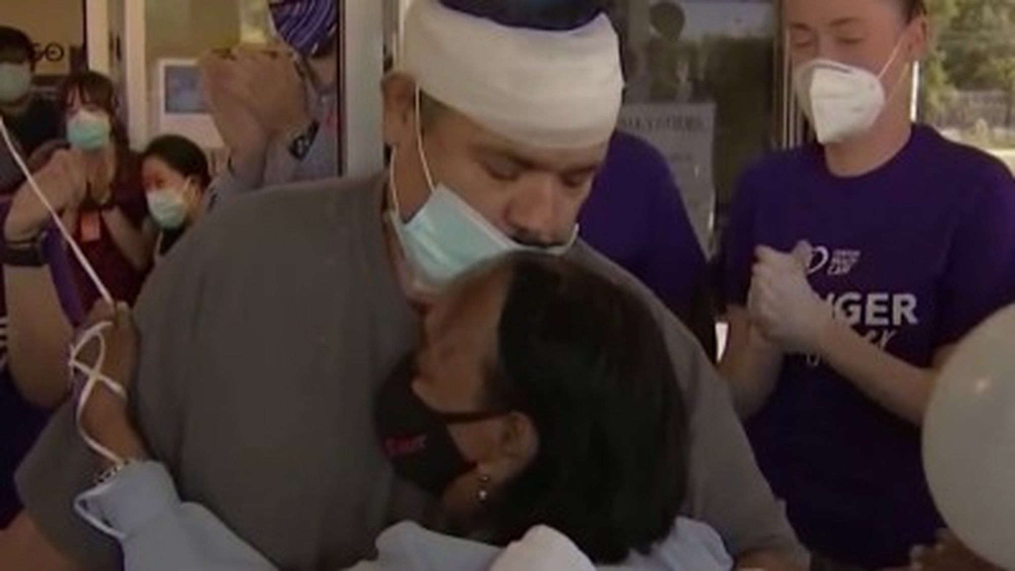 Edward Fortuna embraces his mother upon release from Deptford Center for Rehabilitation and Nursing on Sept 23, 2020 after he spent three months there recovering from coronavirus. Photo: Univision. 