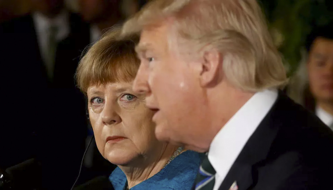 La canciller alemana Angela Merkel y el presidente Trump durante la cumbre del G7 en 2017. Photo: Reuters/ Jonathan Ernst/File Photo.