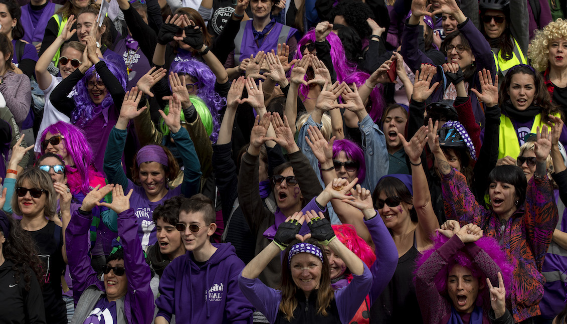 MADRID, SPAIN - MARCH 08: Women shout slogans and make a feminist symbol at the end of a street feminist parade to protest during International Women's Day on March 08, 2020 in Madrid, Spain.  (Photo by Pablo Blazquez Dominguez/Getty Images)