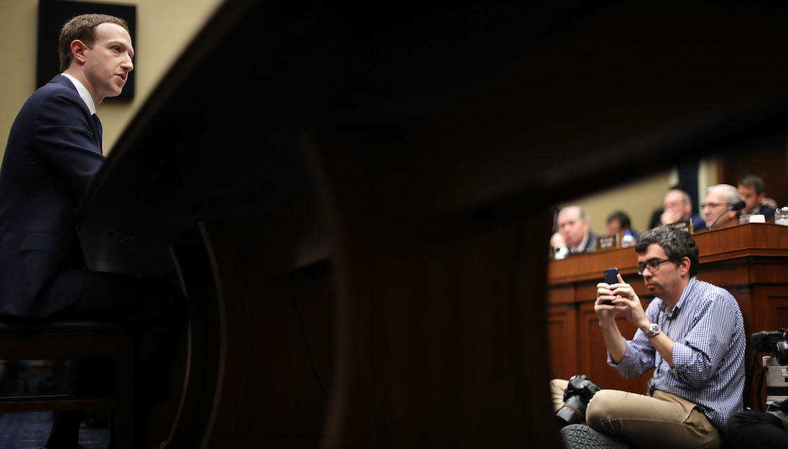 WASHINGTON, DC - APRIL 11: Photographers make images of Facebook co-founder, Chairman and CEO Mark Zuckerberg as he testifies before the House Energy and Commerce Committee at the Rayburn House Office Building on Capitol Hill April 11, 2018 in Washington, DC. (Photo by Chip Somodevilla/Getty Images)