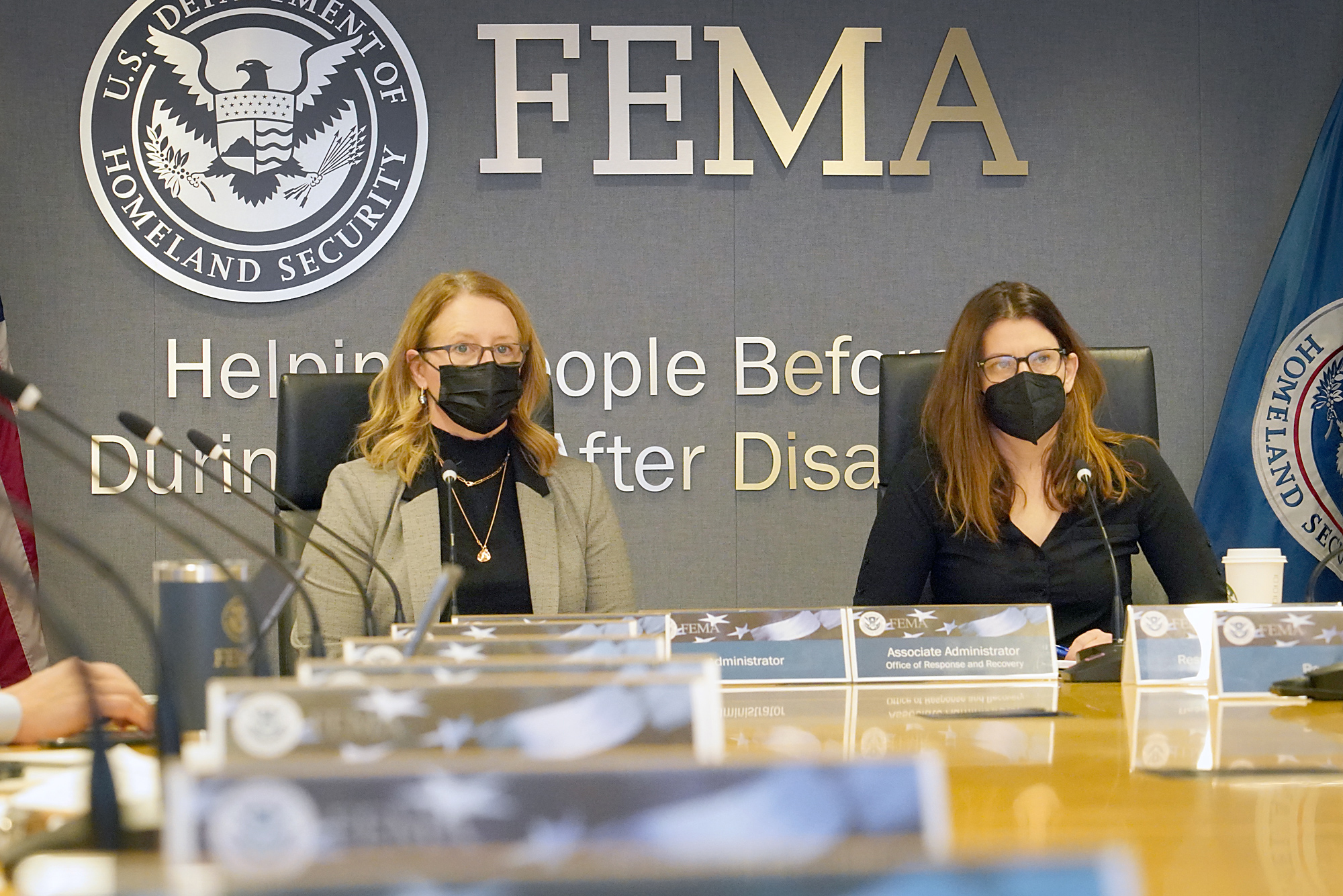 Deanne Criswell, FEMA administrator (left), is seen sharing a status report at a meeting on Monday of her visit to Mayfield, Kentucky.Photo credit: FEMA