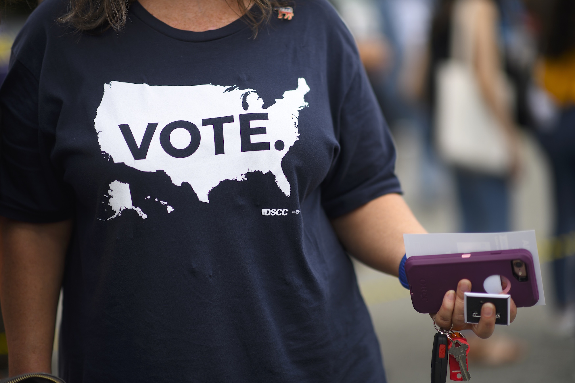 Gloria Thomas wears a t-shirt stating "VOTE" while lining up outside in advance of a campaign rally with former President Barack Obama, Pennsylvania Governor Tom Wolf, and Senator Bob Casey (D- PA) on September 21, 2018 in Philadelphia, Pennsylvania. Photo: Mark Makela/Getty Images.