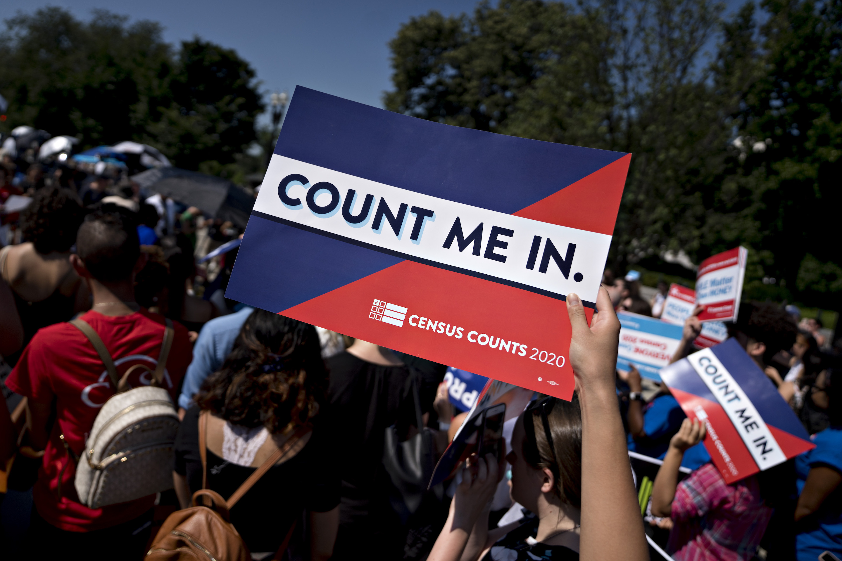 A demonstrator outside the Supreme Court in June, protesting the Trump administration's plans, now abandoned, to include a citizenship question on the 2020 Census. Photo: Andrew Harrer/Getty Images.