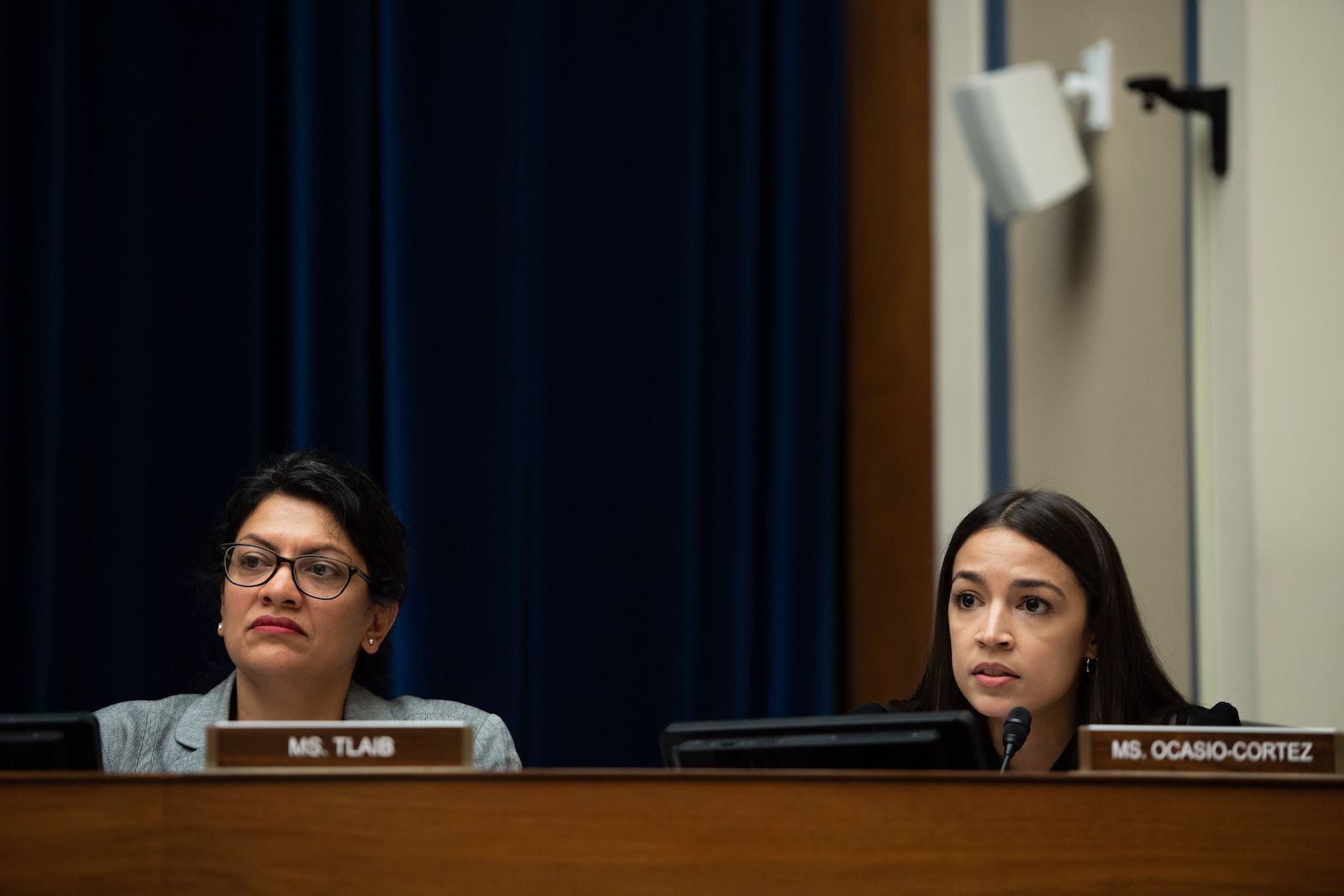 U.S. Representatives Rashida Tlaib and Alexandria Ocasio-Cortez are pictured during a hearing of the House Oversight and Reform Committee in Washington, D.C. on July 18, 2019.SAUL LOEB/AFP/GETTY 